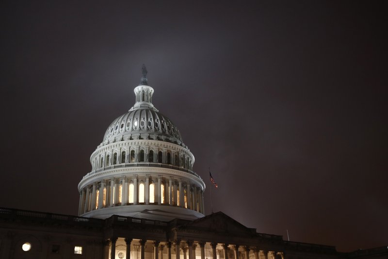  In this Dec. 9, 2019, file photo mist rolls over the U.S. Capitol dome on Capitol Hill in Washington. 
(AP Photo/Patrick Semansky, File)