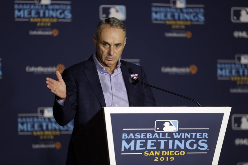 In this file photo Commissioner Rob Manfred speaks during the Major League Baseball winter meetings in San Diego.  
(AP/Gregory Bull)