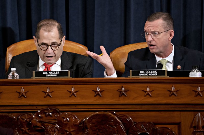 House Judiciary Committee Chairman Rep. Jerrold Nadler, D-N.Y., left, and ranking member Rep. Doug Collins, R-Ga., right, both speaking during a House Judiciary Committee markup of the articles of impeachment against President Donald Trump, on Capitol Hill Thursday, Dec. 12, 2019, in Washington. (Andrew Harrer/Pool via AP)

