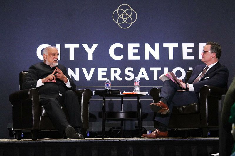 Indian Christian philosopher and author Vishal Mangalwadi (left) speaks with the Rev. Steven Smith — senior pastor of Little Rock’s Immanuel Baptist Church — at Robinson Center Performance Hall in Little Rock on Tuesday. Mangalwadi was the featured guest at the sixth City Center Conversations, an event series the church has hosted since 2017. 