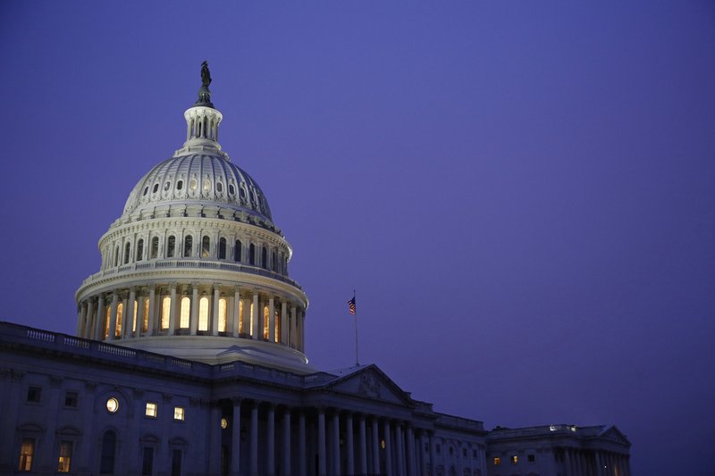 Light shines on the U.S. Capitol dome Friday, Dec. 13, 2019, on Capitol Hill in Washington. (AP Photo/Patrick Semansky)


