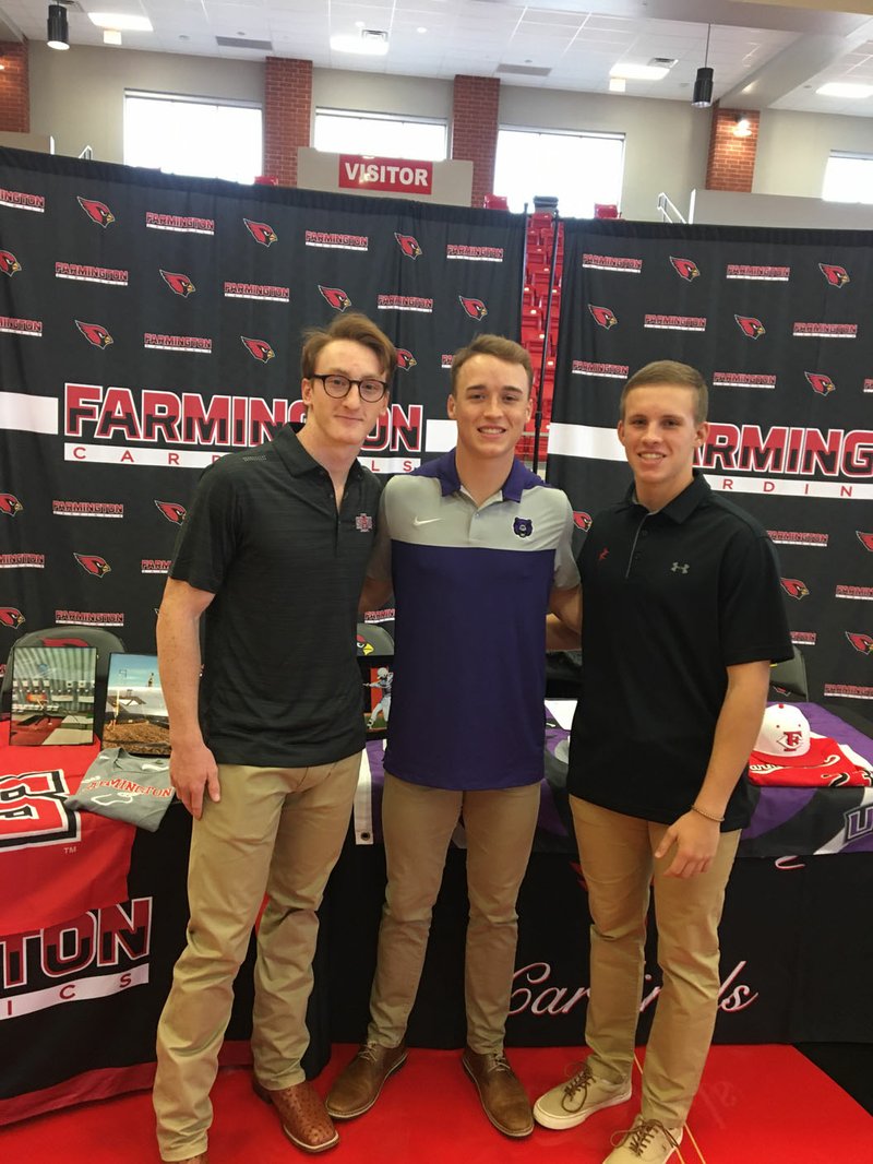 NWA Democrat-Gazette/RICK FIRES Trace South (from left), Drew Sturgeon, and Evan Shoffit signed letters at Cardinal Arena in Farmington Friday to continue their athletes careers in college. Sturgeon signed for baseball with Central Arkansas and Shoffit signed for baseball with Allen County (Kan.) Community College. South is a pole vaulter who signed with Arkansas State.