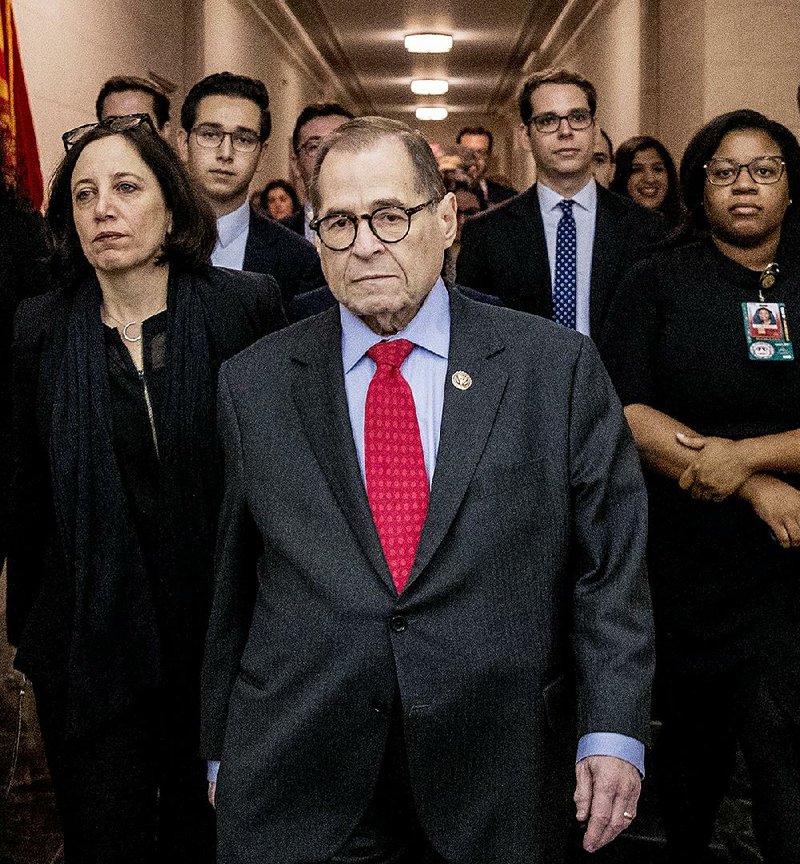 House Judiciary Committee Chairman Jerrold Nadler departs Friday after the sharply divided panel voted to send two articles of impeachment against President Donald Trump to the full House. More photos are available at arkansasonline.com/1214impeachment/ 