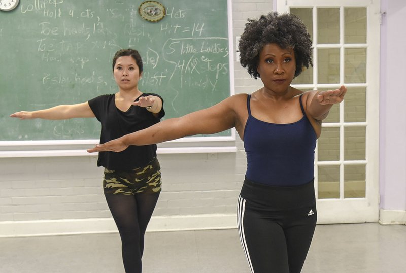 Sonja Littlejohn Barlow leads a warm-up during a private dance lesson at the Quapaw Community Center. - Photo by Grace Brown of the Sentinel-Record.