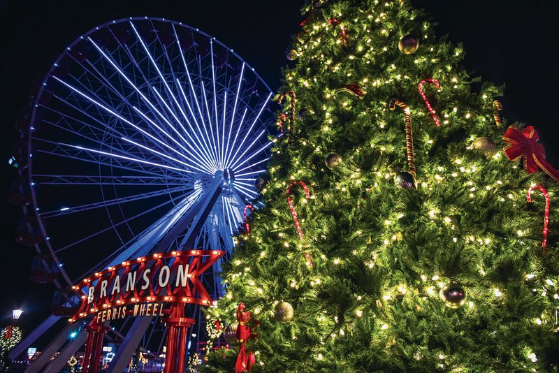 Photo courtesy ExploreBranson.com The 29-foot traditional evergreen lighted by more than 2,500 soft white LED lights stands in front of the Branson Ferris wheel, which forms a picturesque backdrop as it slowly turns.