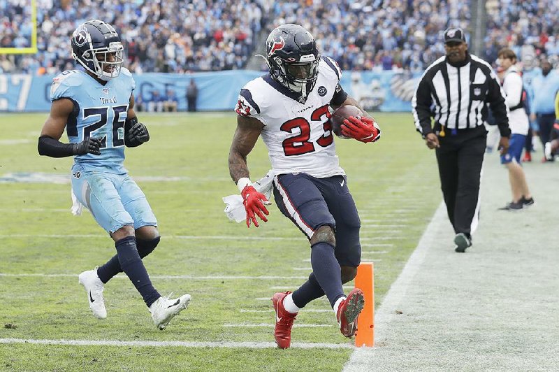 Texans trip Titans, control AFC South