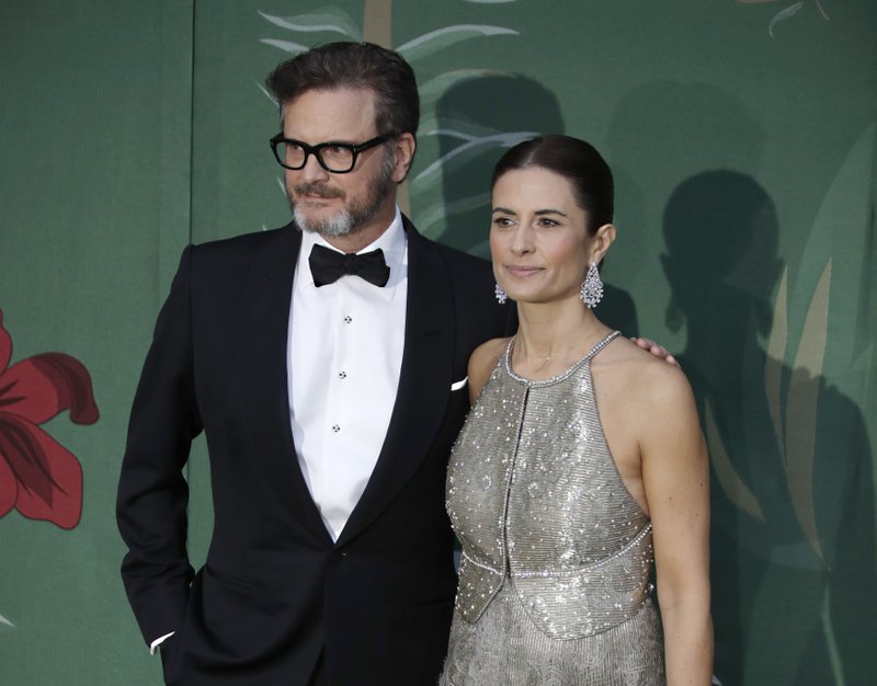 FILE - In this file photo dated Sunday, Sept. 22, 2019, British actor Colin Firth and his wife Livia, pose for photographers upon arrival at the Green Carpet Fashion Awards in Milan, Italy. A statement from their publicists says Colin and Italian eco-campaigner and film producer Livia Firth have separated after 22-years of marriage. (AP Photo/Luca Bruno, FILE)