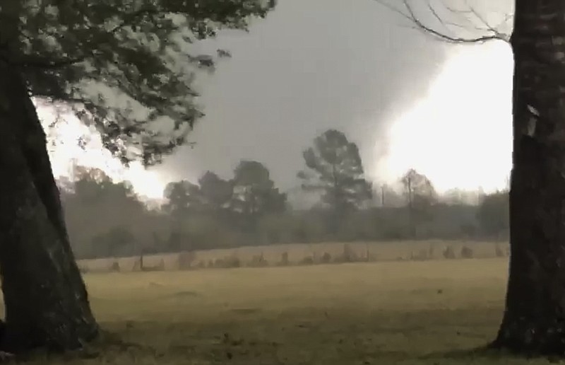 This photo provided by Heather Welch show a tornado in Rosepine, La., Monday, Dec. 16, 2019. Strong storms moving across the Deep South killed at least one person Monday and left a trail of smashed buildings, splintered trees and downed power lines the week before Christmas. (Heather Welch via AP)