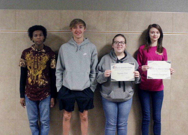 From left, Alvin Miller, Wilson Perdue, Ryleigh Flynn and Autumn Slaughter. These students make up the 1st place team of the Stock Market Game at EHS.