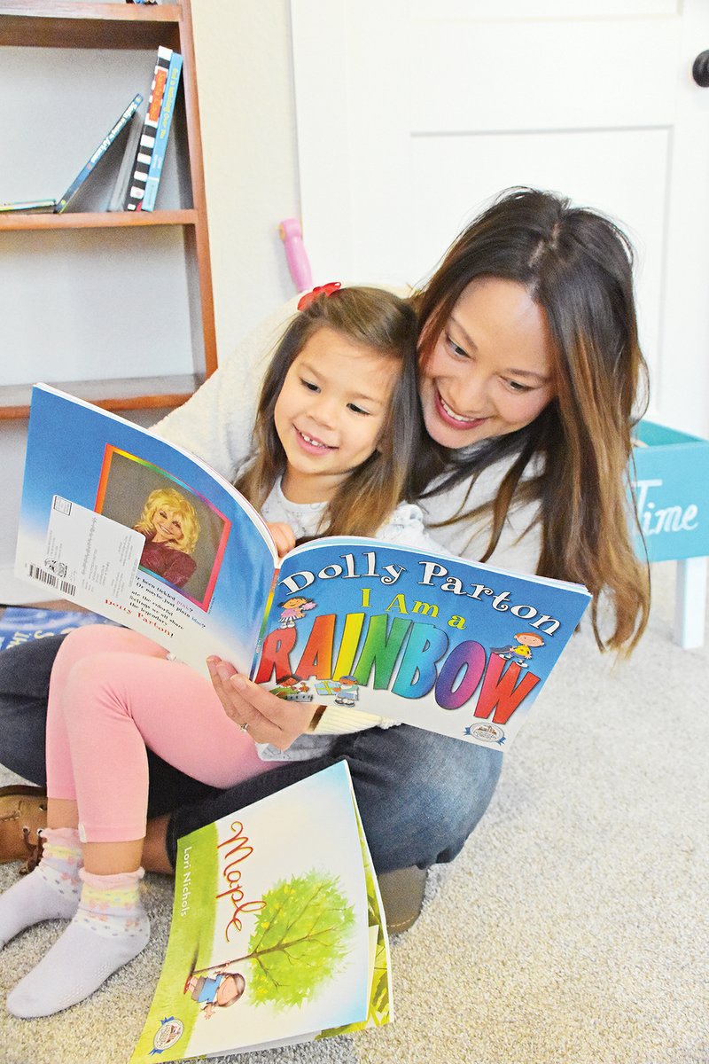 Catalina Linck, 3 1/2, and her mother, Mariana, read I Am a Rainbow in Catalina’s bedroom in their Conway home. Catalina receives a free book each month through the Dolly Parton Imagination Library program. The 2019 Conway Area Leadership Institute class project is to provide a book for 100 babies born in 2020 at Conway Regional Medical Center through the Imagination Library program, in partnership with the United Way of Central Arkansas. Catalina’s father, Ed Linck, is chief operating officer at the Conway Area Chamber of Commerce and oversees the leadership-institute program.