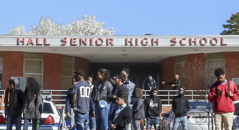 Students are shown outside Little Rock's Hall Senior High School in this 2018 file photo.