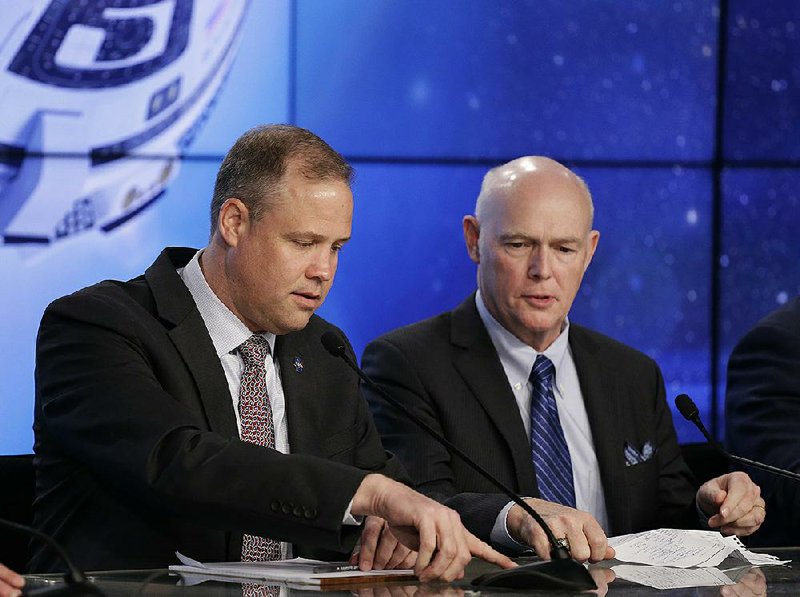 NASA administrator Jim Bridenstine (left) and Tory Bruno, president and chief executive of United Launch Alliance, speak at Kennedy Space Center in Cape Canaveral, Fla., about Friday’s failed capsule launch.  
