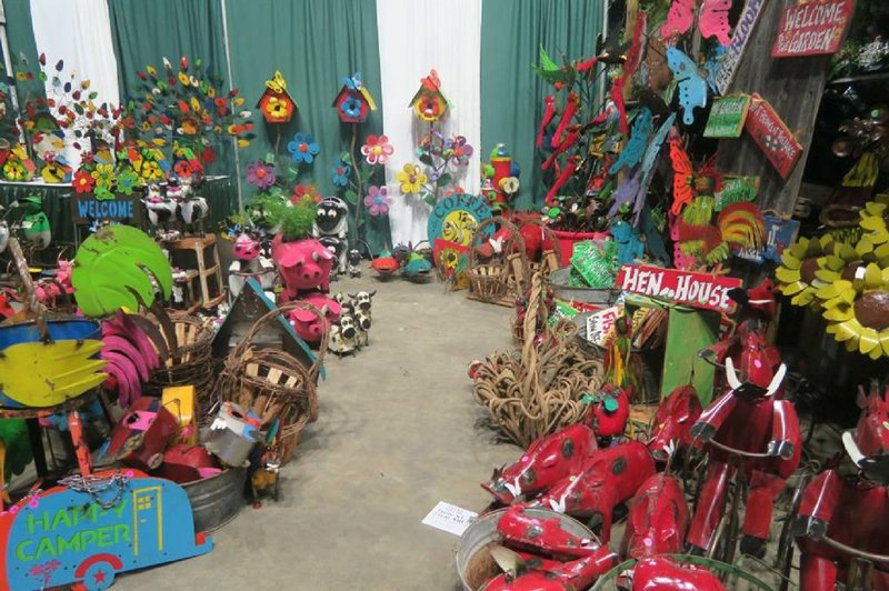 As seen at the Arkansas Flower and Garden Show, garden ornaments appeal to many interests.  (Special to the Democrat-Gazette/Janet B. Carson)