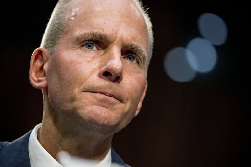 FILE - In this Oct. 29, 2019, file photo Boeing Company President and Chief Executive Officer Dennis Muilenburg appears before a Senate Committee on Commerce, Science, and Transportation hearing on 'Aviation Safety and the Future of Boeing's 737 MAX' on Capitol Hill in Washington. Muilenburg is resigning amid ongoing problems at the company over the troubled Max 737 aircraft. The board of directors said Monday, Dec. 23 that Muilenburg is stepping down immediately. The board's current chairman David Calhoun will become president and CEO on Jan. 13, 2020. (AP Photo/Andrew Harnik, File)

