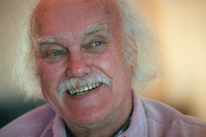 FILE - In this Oct. 21, 1998 file photo, Ram Dass, best known for the 1971 bestseller &quot;Be Here Now,&quot; smiles during an interview at his San Anselmo, Calif., home. The 1960s counterculture spiritual leader and early LSD proponent died, Sunday, Dec. 22, 2019 at his home in Maui, Hawaii. He was 88. (AP Photo/Susan Ragan, File)