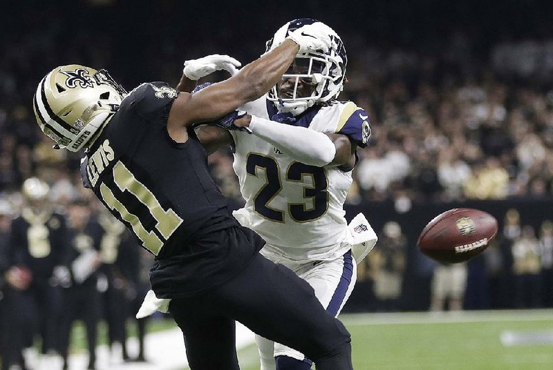 Los Angeles Rams cornerback Nickell Robey-Coleman (right) breaks up a pass intended for New Orleans Saints wide receiver Tommylee Lewis during the second half of the NFC Championship Game on Jan. 20 in New Orleans. Robey-Coleman was not called for interference on the play, a noncall that possibly affected the outcome of the game, which resulted in many Saints fans boycotting the Super Bowl.
(AP/Gerald Herbert)