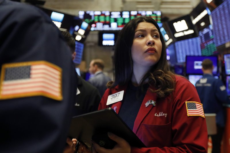 In this Dec. 13, 2019, file photo trader Ashley Lara works on the floor of the New York Stock Exchange. 
(AP Photo/Richard Drew, File)