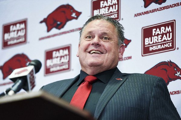 NWA Democrat-Gazette/CHARLIE KAIJO Coach Sam Pittman speaks, Monday, December 9, 2019 during an introductory press conference at the Walker Pavilion in Fayetteville.