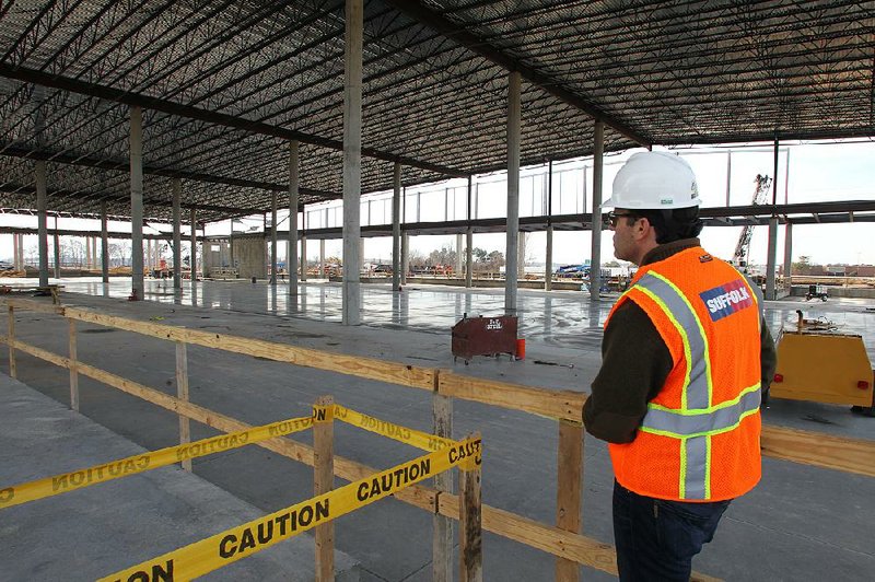 Carlton Saffa, project manager for Saracen Casino Resort, looks over the progress of the building that will house the 80,000-squarefoot gambling floor of the casino.
(Arkansas Democrat-Gazette/Dale Ellis)