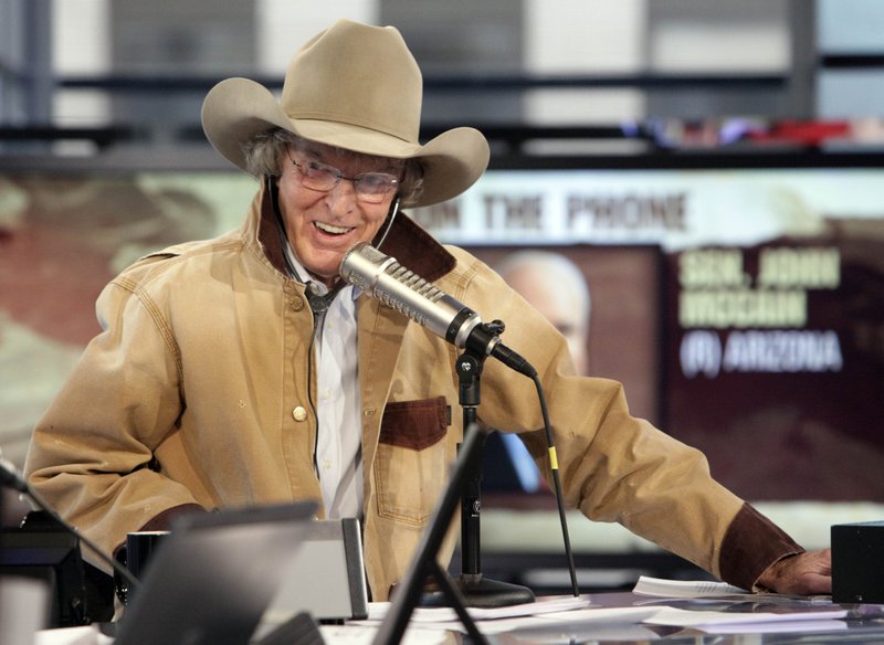   In this Monday, Oct. 5, 2009 file photo, radio personality Don Imus interviews Sen. John McCain, R-Ariz., by telephone during his debut show on the Fox Business Network in New York. Disc jockey Don Imus, whose career was made and then undone by his acid tongue during a decades-long rise to radio stardom and an abrupt public plunge after a nationally broadcast racial slur, has died, Friday, Dec. 27, 2019. He was 79.
(AP Photo/Richard Drew, File)