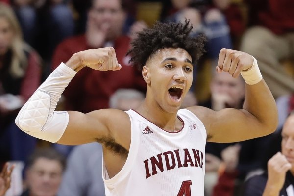 Indiana's Trayce Jackson-Davis (4) reacts after making a shot and getting fouled by Louisiana Tech's Amorie Archibald (3) during the second half of an NCAA college basketball game, Monday, Nov. 25, 2019, in Bloomington, Ind. Indiana won 88-75. (AP Photo/Darron Cummings)