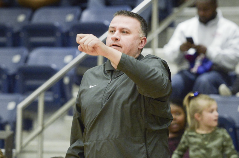 In this Jan. 2019 file photo, Bentonville West High School head coach Greg White calls out to his players during a basketball game at Wolverine Arena at Bentonville West in Centerton.