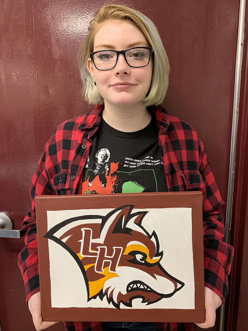 Lake Hamilton High School art student Fiona Hunter recently painted the Lake Hamilton mascot on a canvas to display at Dawson Educational Cooperative building. - Submitted photo