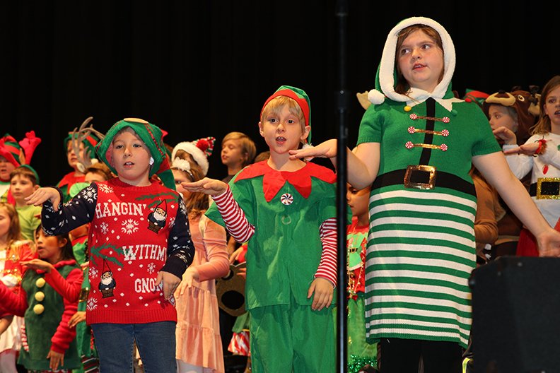 Lake Hamilton Elementary School second-grade students present their winter musical, "The Littlest Reindeer." The cast included, from left, Tyler Grasseschi, Brayden Angel and Lily Norman. - Submitted photo