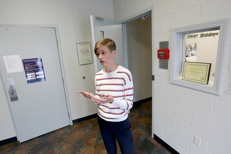 NWA Democrat-Gazette/DAVID GOTTSCHALK Kristen McAllister, director of the Northwest Arkansas Crisis Stabilization Unit, speaks Thursday in the lobby of the unit in Fayetteville.