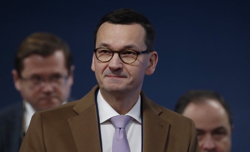 Polish Prime Minister Mateusz Morawiecki arrives for an EU summit in Brussels, Friday, Dec. 13, 2019. European Union leaders are gathering Friday to discuss Britain's departure from the bloc amid some relief that Prime Minister Boris Johnson has secured an election majority that should allow him to push the Brexit deal through parliament. (Christian Hartmann, Pool Photo via AP)