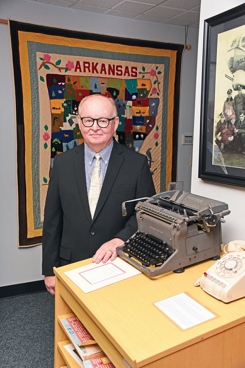 Jimmy Bryant shows some of the artifacts on display at the University of Central Arkansas Archives — a manual typewriter and a rotary dial telephone. Bryant has resigned as UCA director of archives and university historian, effective Dec. 31, and will begin his new job as director of Arkansas Heritage on Jan. 6.