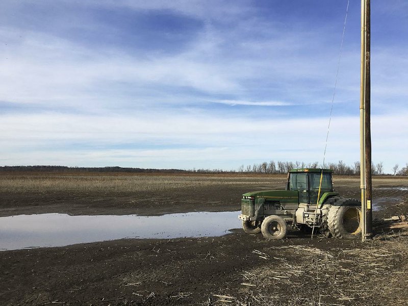 Record floods ruined this tractor in Holt County, Mo., shown in this 2019 file photo.