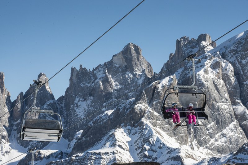 Skiers ride chairlifts near Falcade in the Dolomite Range of northeastern Italy. Ski safaris, which let travelers journey through the scenic towns, valleys and alpine hotels, have become increasingly popular here and elsewhere.
(The New York Times/Susan Wright)