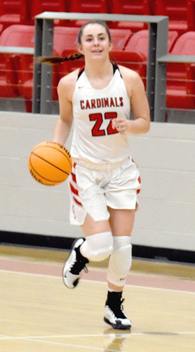 MARK HUMPHREY ENTERPRISE-LEADER/Farmington senior Makenna Vanzant is all smiles bringing the ball up the court. Vanzant scored 11 points to help Farmington defeat Greene County Tech, 54-31, on Dec. 5 in a first-round game at the Lady Golden Eagle Invitational tournament.