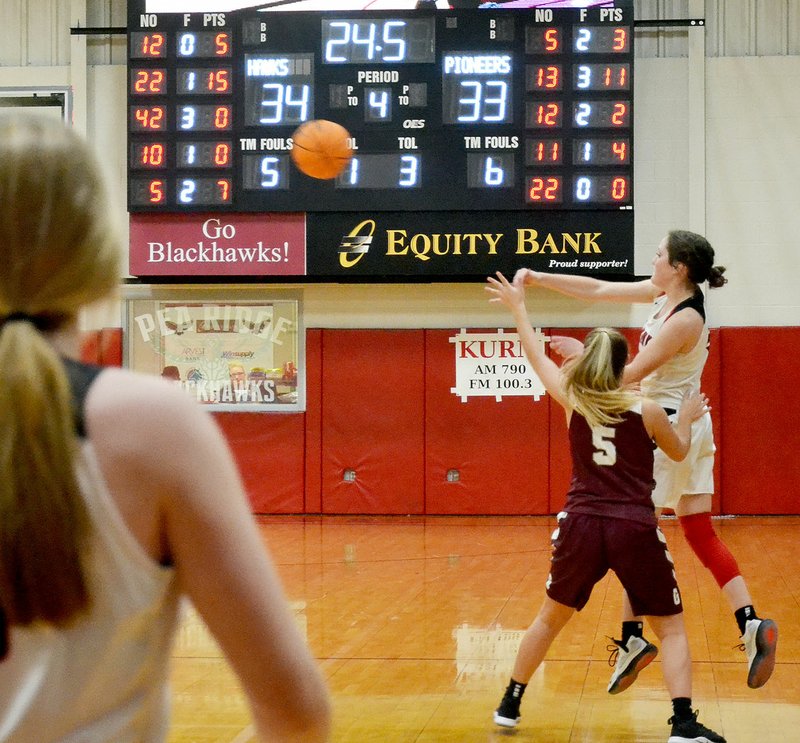 TIMES photograph by Annette Beard Junior Lady Blackhawk Aidan Dayberry (No. 5) threw the ball with just seconds left in the game Thursday, Dec. 20.