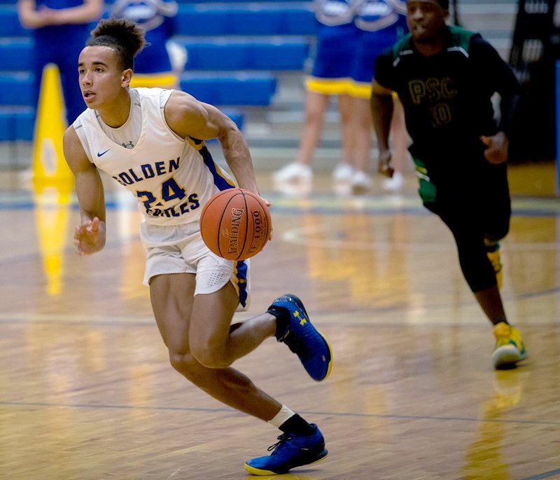Photo courtesy of JBU Sports Information John Brown sophomore Ira Perrier and the No. 10-ranked Golden Eagles host Science and Arts (Okla.) at 7:45 p.m. Thursday at Bill George Arena.