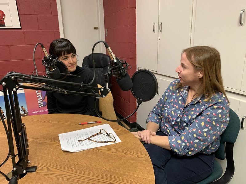 NWA Democrat-Gazette/GARETT MOORE Artist Danielle Hatch (left) from Bentonville discusses diversity and barriers within the female art community with reporter Mary Jordan.