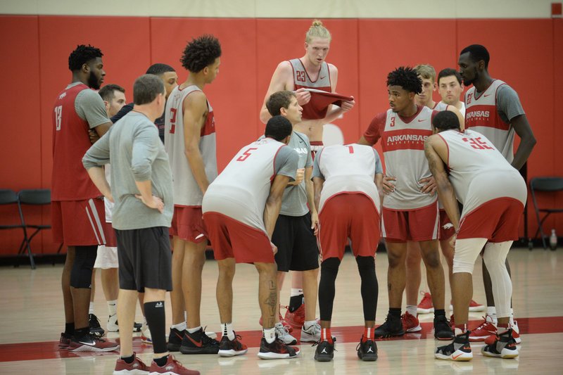 Arkansas coach Eric Musselman directs his players Thursday, Sept. 26, 2019, during practice in the Eddie Sutton Gymnasium inside the Basketball Performance Center in Fayetteville. Musselman and the basketball staff give Razorback players detailed scouting reports before each game. 