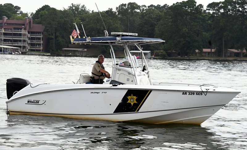 Garland County sheriff's Capt. Shelby Terry on patrol on Lake Hamilton in July 2018. - File photo by Grace Brown of The Sentinel-Record