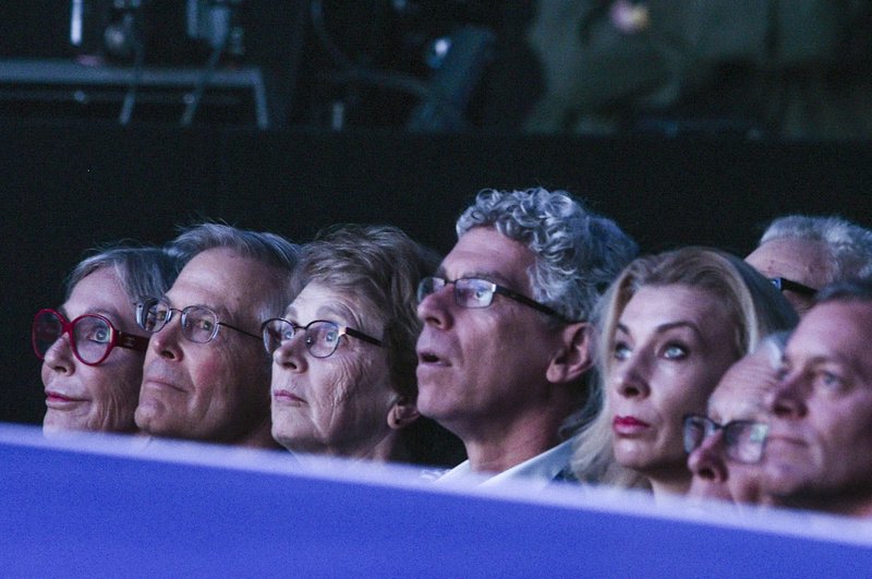 NWA Democrat-Gazette/CHARLIE KAIJO Walton family members listen to speakers during the Walmart shareholders meeting June 7, 2019, at Bud Walton Arena in Fayetteville.