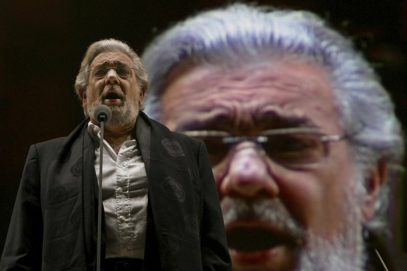 In this file photo, Placido Domingo performs during a sound check prior to a free concert in Mexico City in 2009. Two investigations into Domingo's behavior were opened last year after Associated Press stories in which more than 20 women said the legendary tenor had pressured them into sexual relationships, behaved inappropriately and sometimes professionally punished those who rebuffed him. Dozens of others told the AP that they had witnessed his behavior.
(AP/Marco Ugarte)