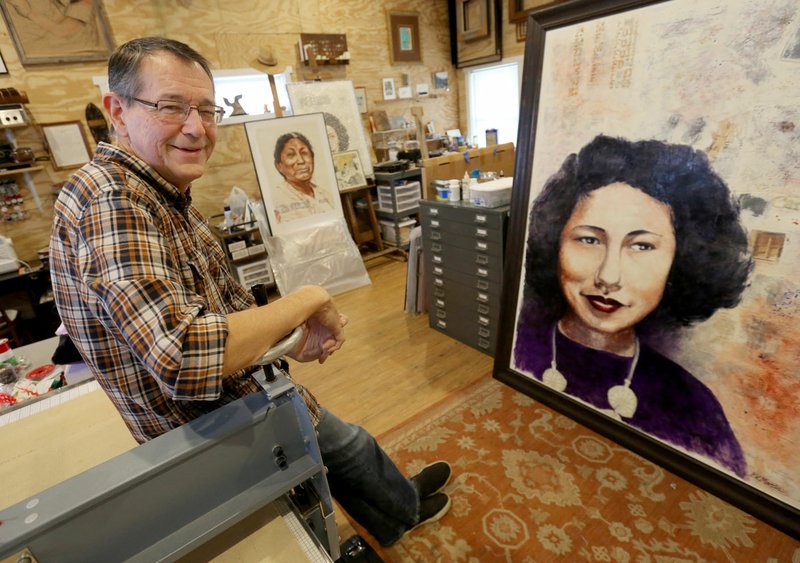 NWA Democrat-Gazette/DAVID GOTTSCHALK Bobby C. Matin, describes his art Dec. 12 in his studio 7 Spring Studio in West Siloam Springs, Okla. Martin, a Native American, uses family photographs to influence his art. The 62-year-old always knew he had a talent for art, but didn't delve into his craft seriously until he was in his 30s and failed to find success as a musician, he said.