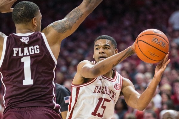 Mason Jones, Arkansas guard, passes the ball in the second half vs Texas A&M Saturday, Jan. 4, 2020, at Bud Walton Arena in Fayetteville.