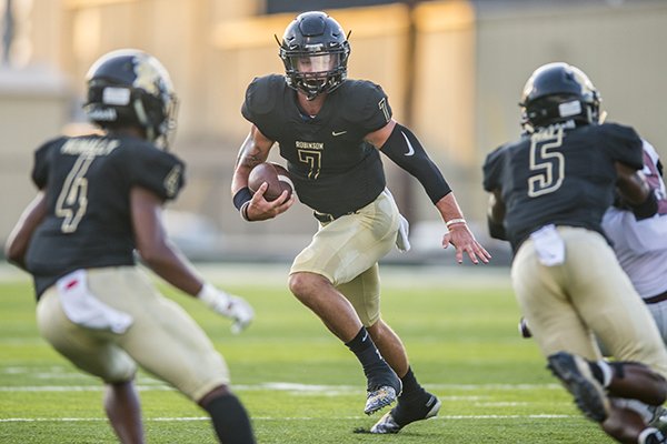 JT Towers of Joe T. Robinson runs with the ball during a game against Springdale on Friday, Aug. 30, 2019, at Charlie George Stadium in Little Rock. 