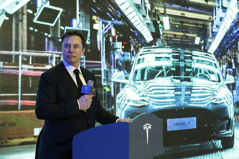 Tesla plans to increase its investment in China and set up a design center to “create a car for worldwide sale,” Chief Executive Officer Elon Musk said at Tuesday’s ceremony in Shanghai. More photos are available at arkansasonline.com/18tesla/.
(AP)