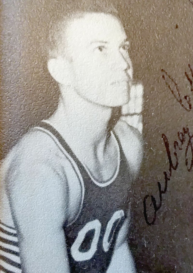 Yearbook photo/Aubrey Cuzick started at guard for the 1955-1956 Lincoln boys basketball team. He helped the Wolves rack up 33 wins and become the first team in school history advance to the state tournament. Teammate Loyd Jones describes Cuzick as the kind of guy you needed at guard that could penetrate and get the ball down the court. He was named to the All-tournament team of the Springdale Tournament.