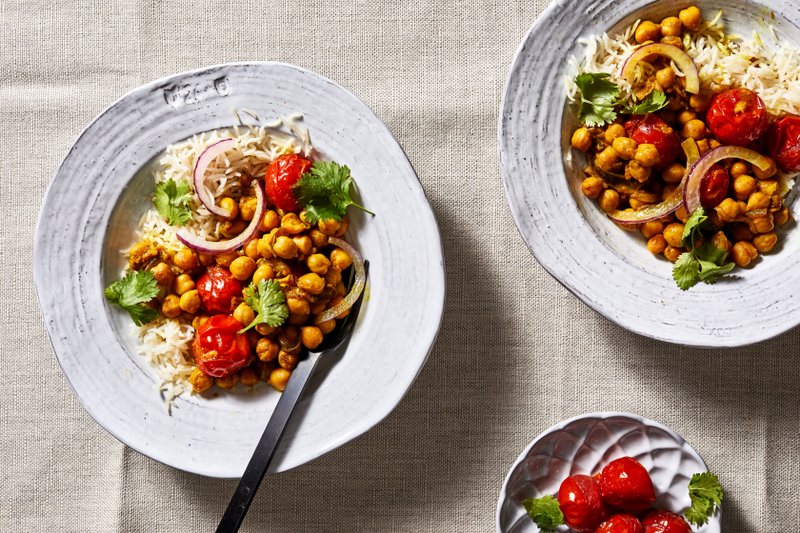 Ginger Turmeric Chickpeas With Roasted Cherry Tomatoes. (For The Washington Post/Stacy Zarin Goldberg)