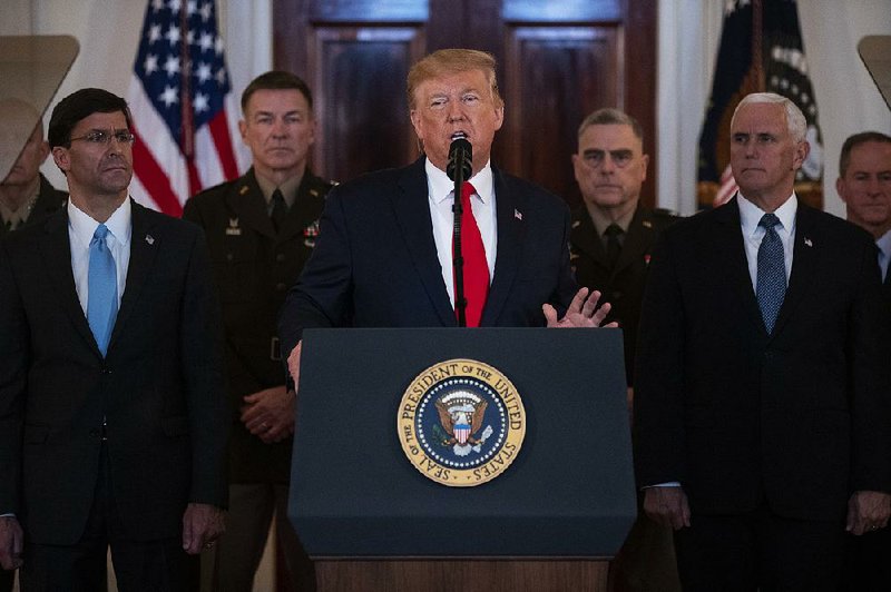 President Donald Trump said Wednesday at the White House that the United States was “ready to embrace peace with all who seek it.” More photos at arkansasonline.com/19trump/.
(AP/Evan Vucci)