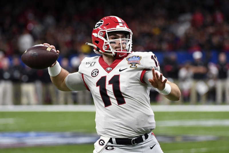 Georgia quarterback Jake Fromm (11) passes in the first half of the Sugar Bowl NCAA college football game against Baylor in New Orleans, Wednesday, Jan. 1, 2020. 
(AP Photo/Bill Feig)