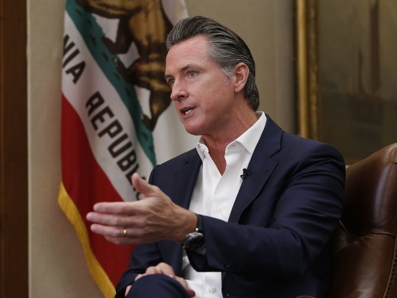 FILE - In this Oct. 8, 2019, file photo, California Gov. Gavin Newsom speaks during an interview in Sacramento, Calif. (AP Photo/Rich Pedroncelli, File)